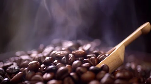 Coffee beans roasting with smoke,  selective focus, and soft focus. Stock Footage 241459862