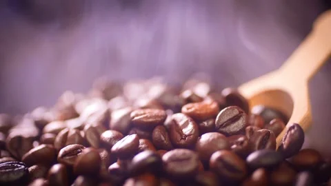 Coffee beans roasting with smoke,  selective focus, and soft focus. Stock Footage 241462180