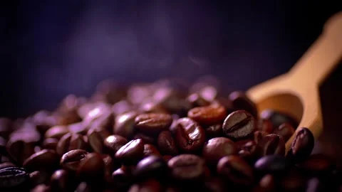 Coffee beans roasting with smoke,  selective focus, and soft focus. Video stock 244194862