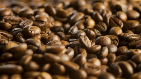 The coffee beans rotate in a circle. Close-up coffee pattern Stock Footage 316089921