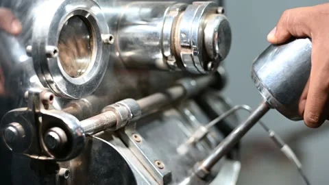 Coffee beans rotate in a coffee bean roasting machine. Stock Footage 171243294