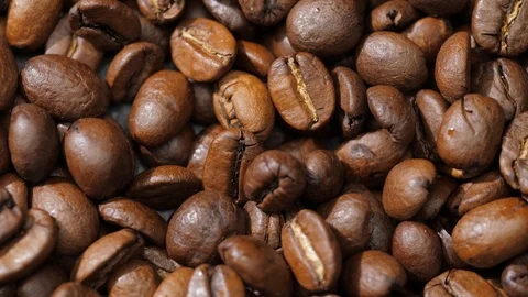 Coffee beans rotate on the pan Stock Footage 120371532