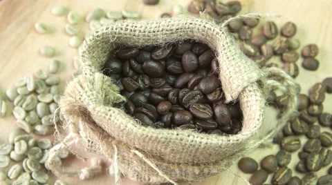 Coffee beans rotating in burlap, close up Stock Footage 67902650