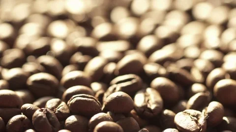 Coffee beans rotation in the slowed-down movement macro. Stock Footage