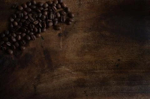 Coffee Beans on Rustic Chopping Board with Copy Space, Flat Lay Background Фото