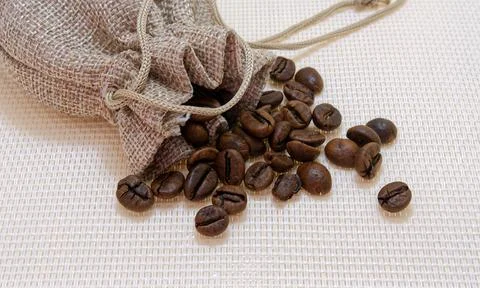 Coffee beans in a sack Stock Photos