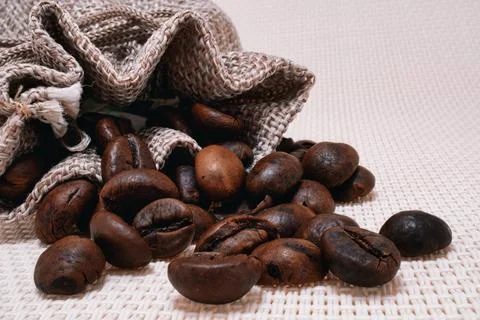 Coffee beans in a sack Fotos de archivo