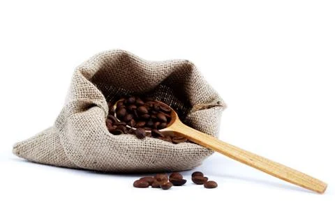 Coffee beans in a sacking bag. Stock Photos