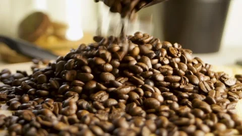 Coffee beans scatter and fill the frame. Close-up coffee pattern Stock Footage 316089727