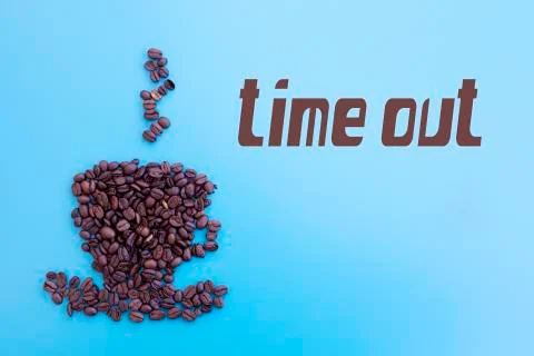 Coffee beans in shape of a cup with word 'Time out' Foto stock