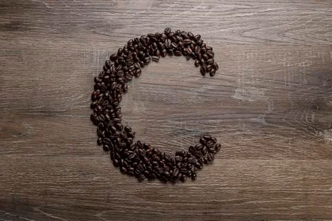 Coffee Beans in the Shape of Letter C Stock Photos