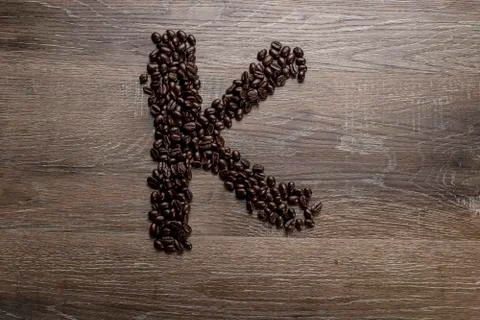 Coffee Beans in the Shape of Letter K Stockfoto's