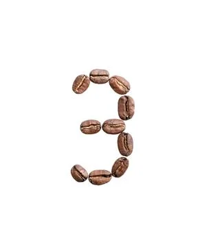 Coffee beans situated in shape of number three. Foto stock