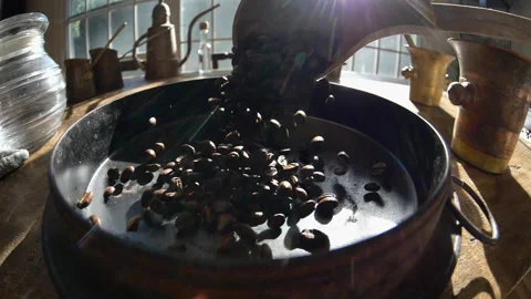 Coffee Beans Slow Motion Falling Into Roasting Pot Stock Footage 233016312