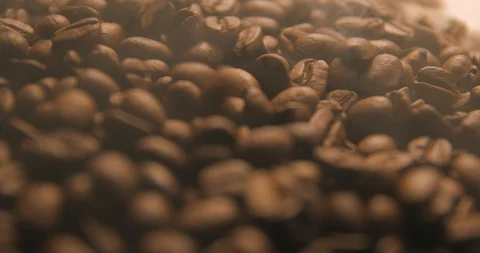 Coffee beans slow motion indoor Stock Footage 121647363