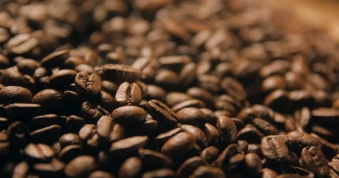 Coffee beans slow motion indoor Stock Footage 121647592