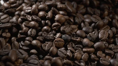 Coffee beans slow motion rotating Stock Footage 101075041