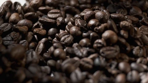 Coffee beans slow motion rotating Stock Footage 101075050