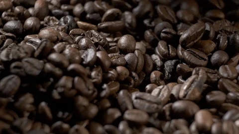 Coffee beans slow motion rotating Stock Footage 101075074