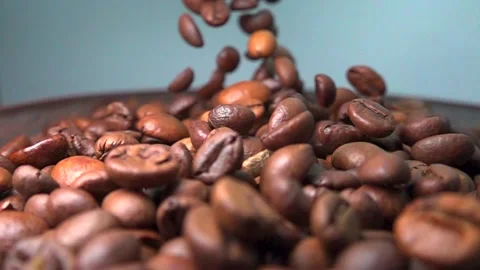 Coffee beans slowly fall down Stock Footage 146749179