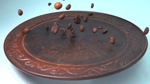 Coffee beans slowly fall down Stock Footage 146749215