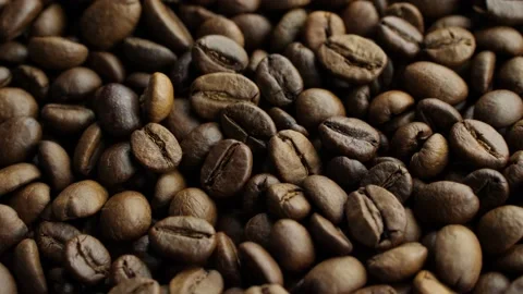 Coffee beans slowly spinning macro Stock Footage 165545505