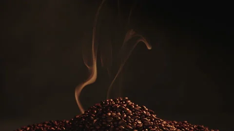 Coffee beans with smoke coming form coffee beans. Stock Footage 145274756