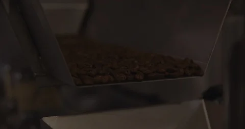 Coffee Beans Spilling Out Of Machine 스톡 동영상 105368696