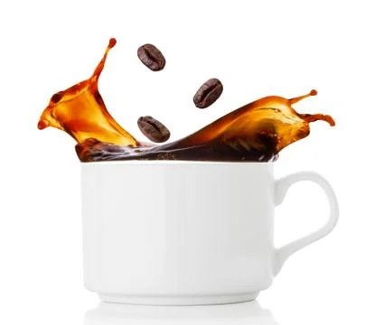 Coffee beans splash in cup of coffee Stock Photos