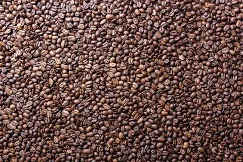 Coffee beans on the table background blurred abstract blurred Stock Photos
