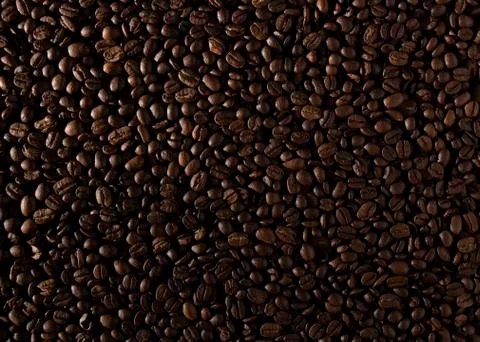 Coffee beans on the table background blurred abstract blurred Stock Photos