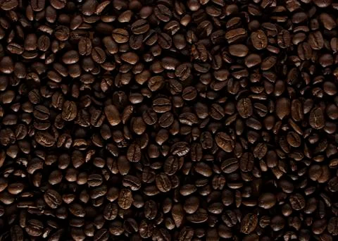 Coffee beans on the table background blurred abstract blurred Stock Photos