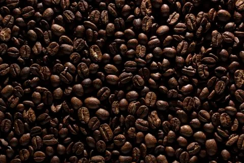 Coffee beans on the table background blurred abstract blurred Stock Photos