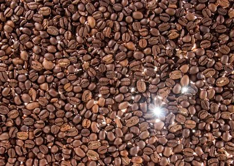 Coffee beans on the table background blurred abstract blurred Stock Photos