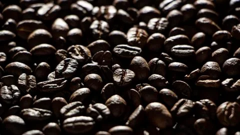 Coffee beans on the table background blurred abstract blurred Stockfoto's