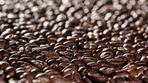 Coffee beans on the table background blurred abstract blurred Stock Photos