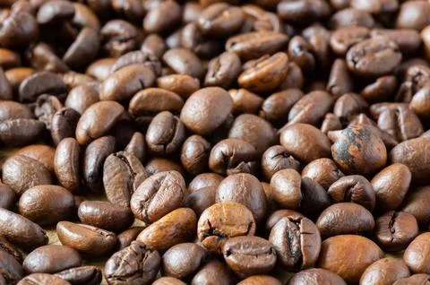 Coffee beans on the table for the background Fotos de archivo