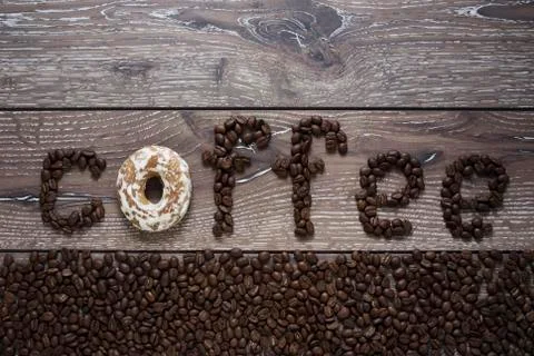 Coffee beans on a table Stock Photos