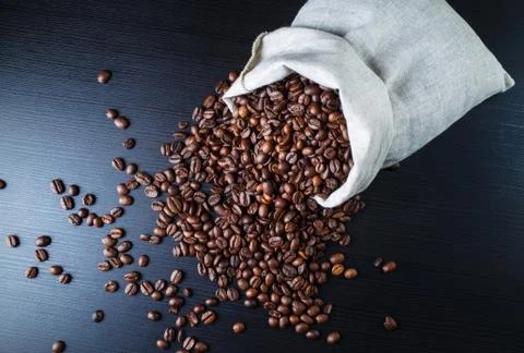 Coffee beans on the table Stock Photos