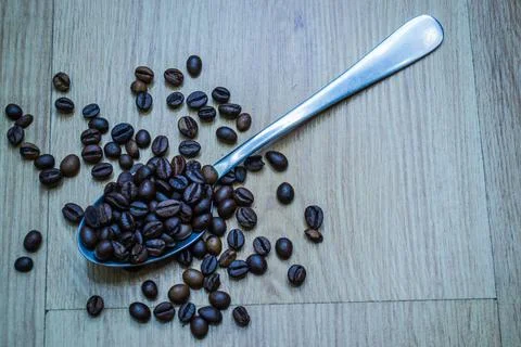 Coffee beans on the table Stock Photos