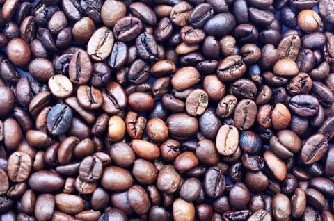 Coffee beans on the table texture background Foto stock