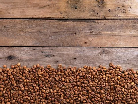Coffee beans on table top view Stock Photos