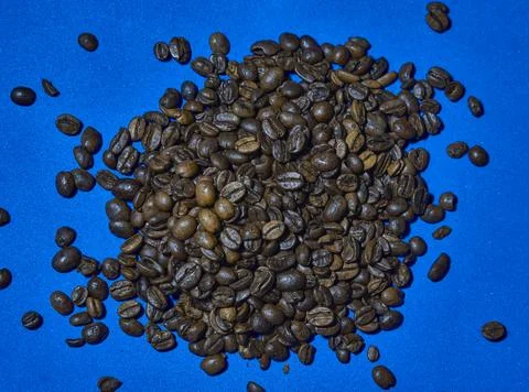 Coffee beans texture on blue background 写真素材