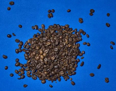 Coffee beans texture on blue background 写真素材