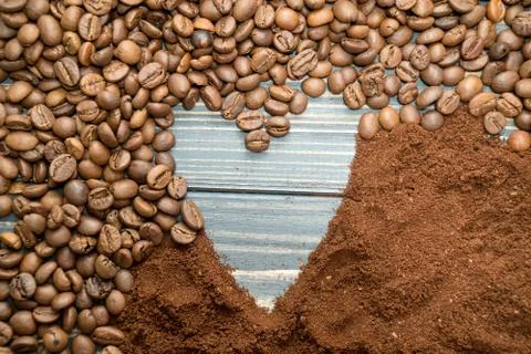 Coffee beans texture. Coffee background. The heart of coffee 스톡 사진