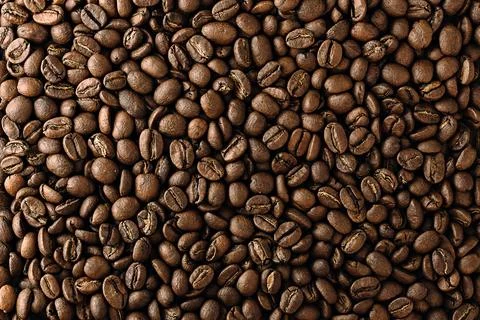 Coffee beans texture. ?offee beans background. close-up of ?offee beans to Stock Photos