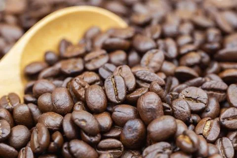 Coffee beans texture or coffee beans background. Brown roasted coffee beans. Stockfoto's