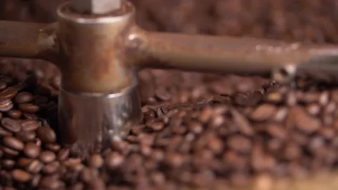 Coffee beans turning in roaster Video stock 237758628