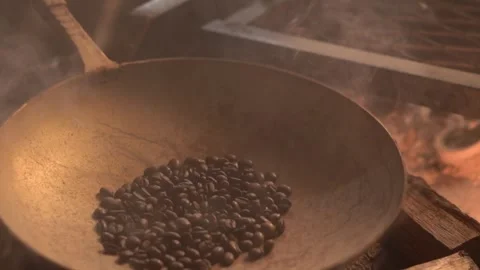 Coffee beans undergoing the process of roasting Stock-Footage 243348377