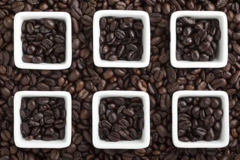 Coffee beans in a vessel Stock Photos